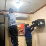 Two dedicated network engineers of BytesCrafter working on an IT Infrastructure and Cybersecurity Enhancement Project